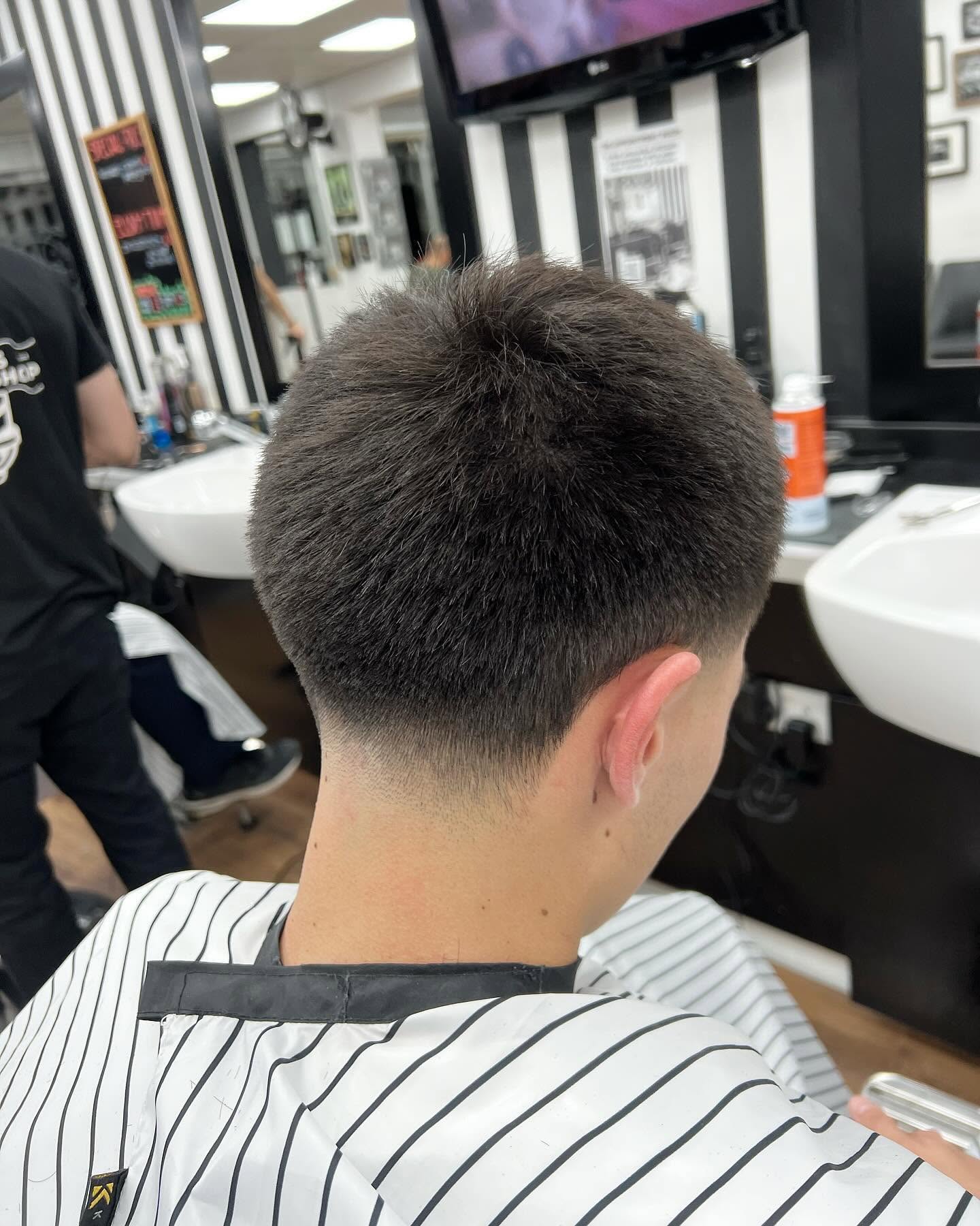 Clean taper fade finished at Andys Barbershop
